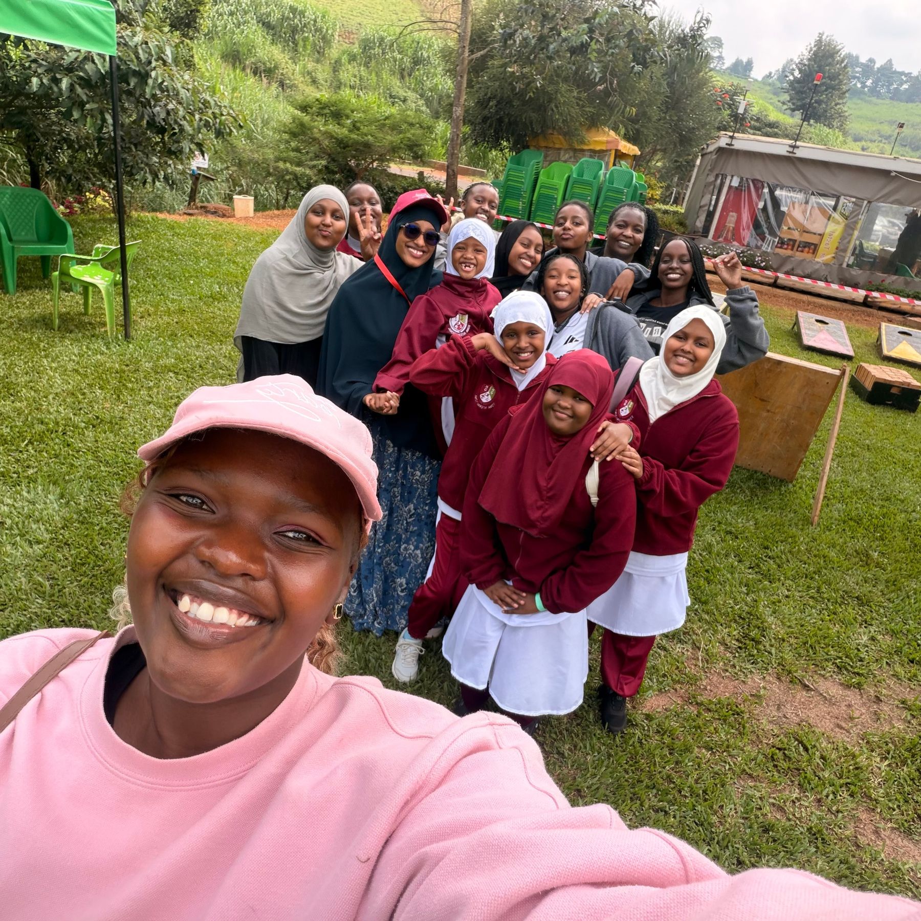 Students and staff taking a group selfie